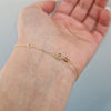 Armband kvinnosymbol guld