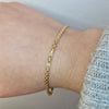 Armband tunn x-länk 18k guld