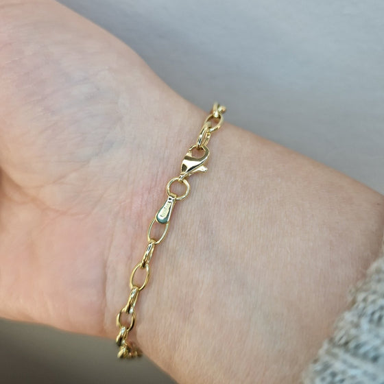 Armband med ovala ringar i 18k guld