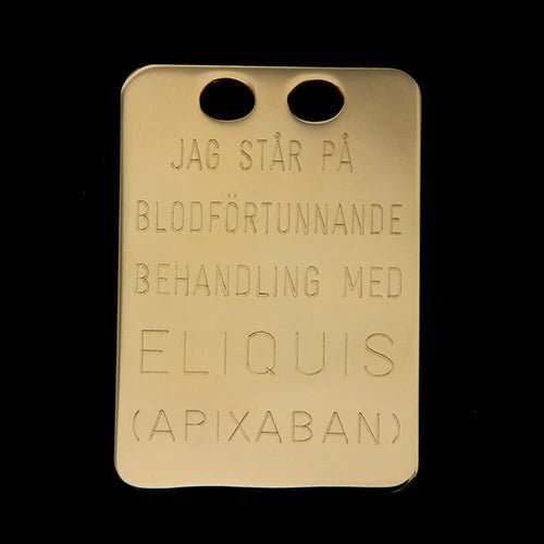 Eliquisbricka i guld