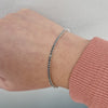 Tennisarmband 18k vitguld - svarta diamanter