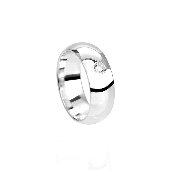 Vigselring bred blank med en diamant i 18k vitguld