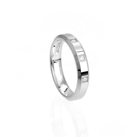 Elegant vigselring med 3 diamanter i 18k vitguld